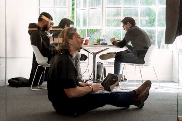 Judges scoring at the AI for Good hackathon