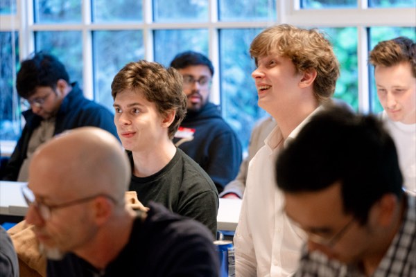 Applause for a demo at the AI for Good hackathon