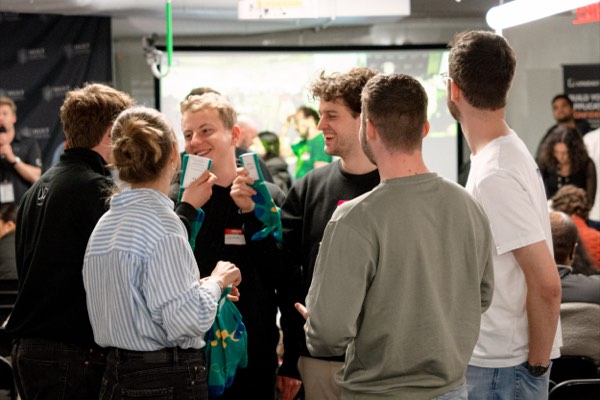 Crowd during finals at the AI for Good hackathon